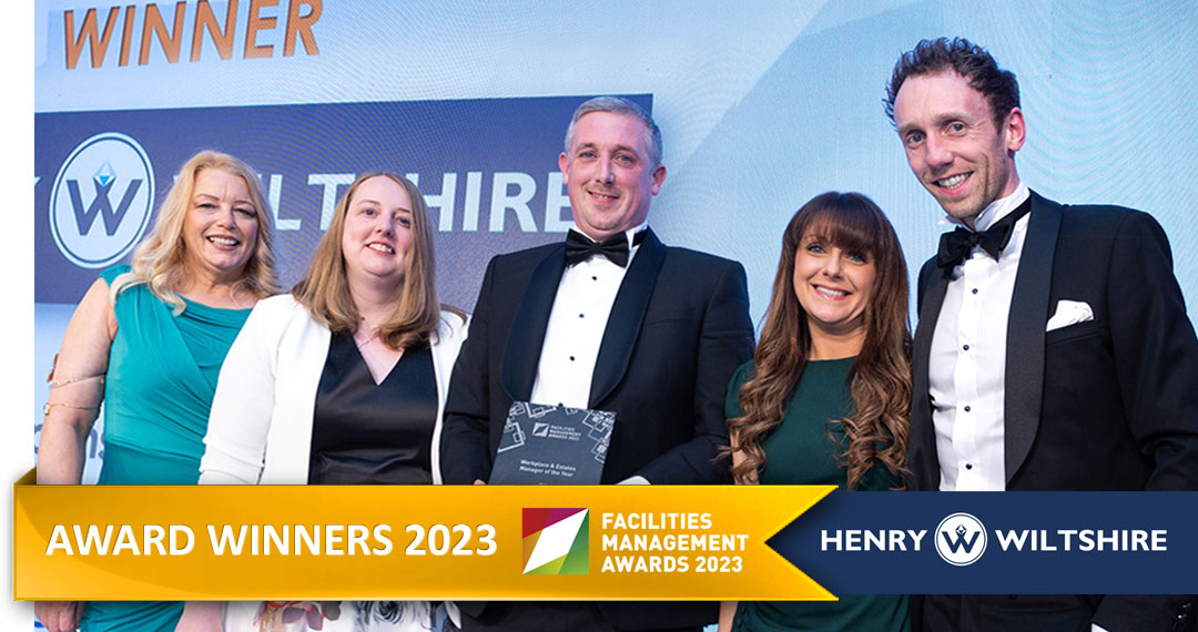 Henry Wiltshire accepting their award at Facilities Management Awards 2023